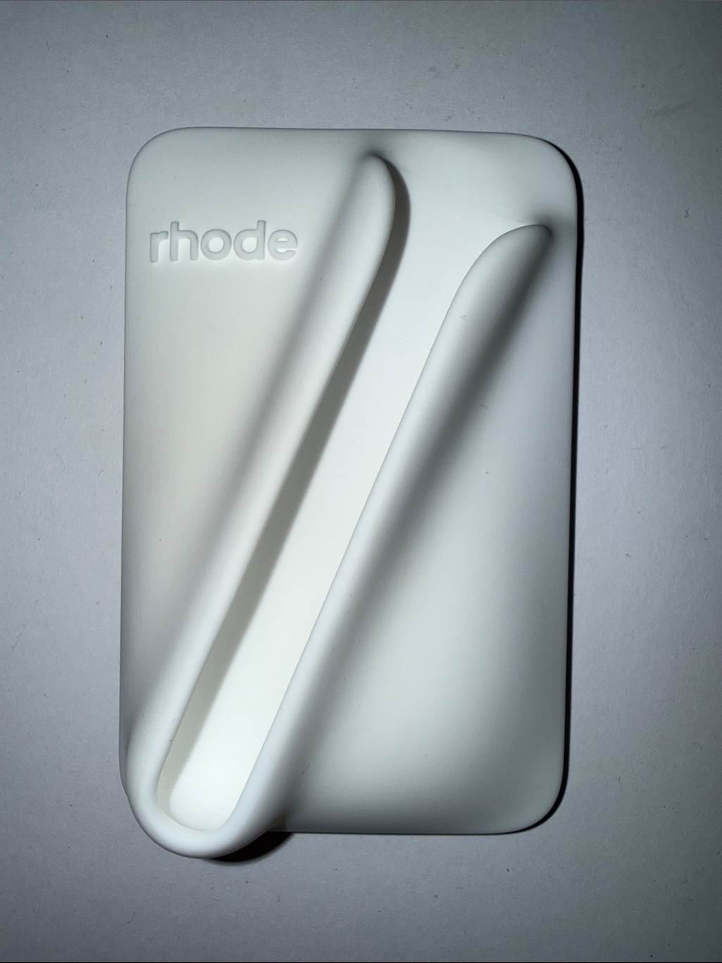 Rhode White Silicone Phone Holder With Angled Groove